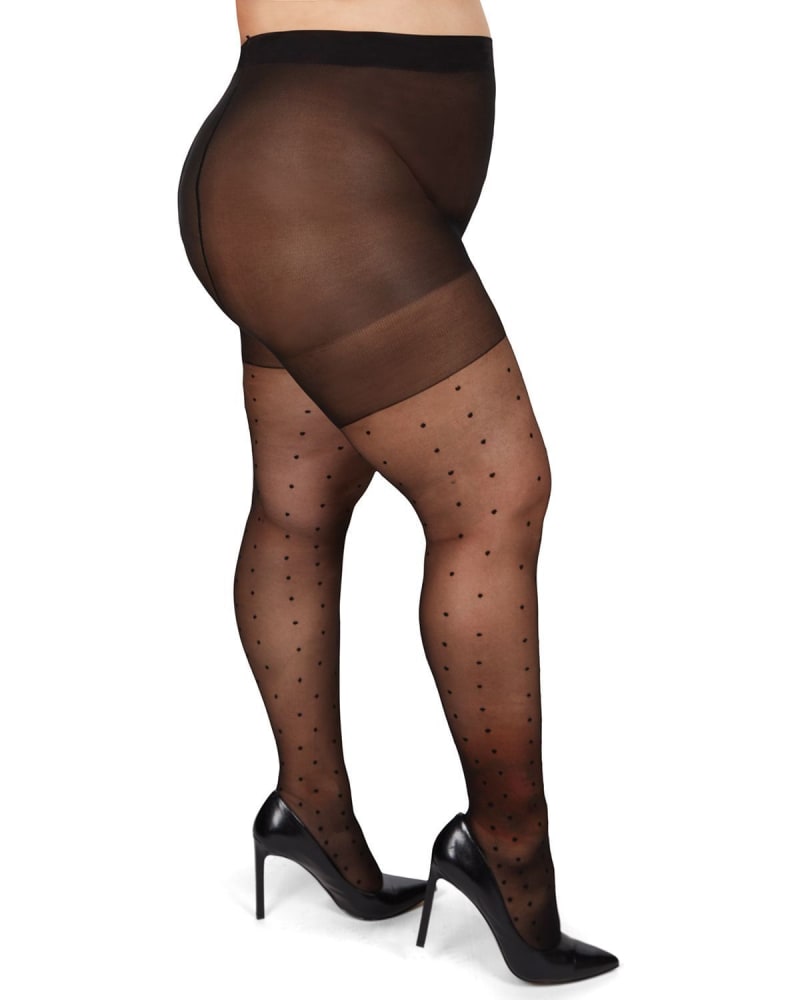 Side of a model wearing a size 7X Pindot Sheer Plus Size Curvy Control Top Tights in Black-Black by Memoi. | dia_product_style_image_id:299867